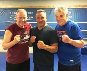 Peter KIng in best boxing pose wearing blue tshirt